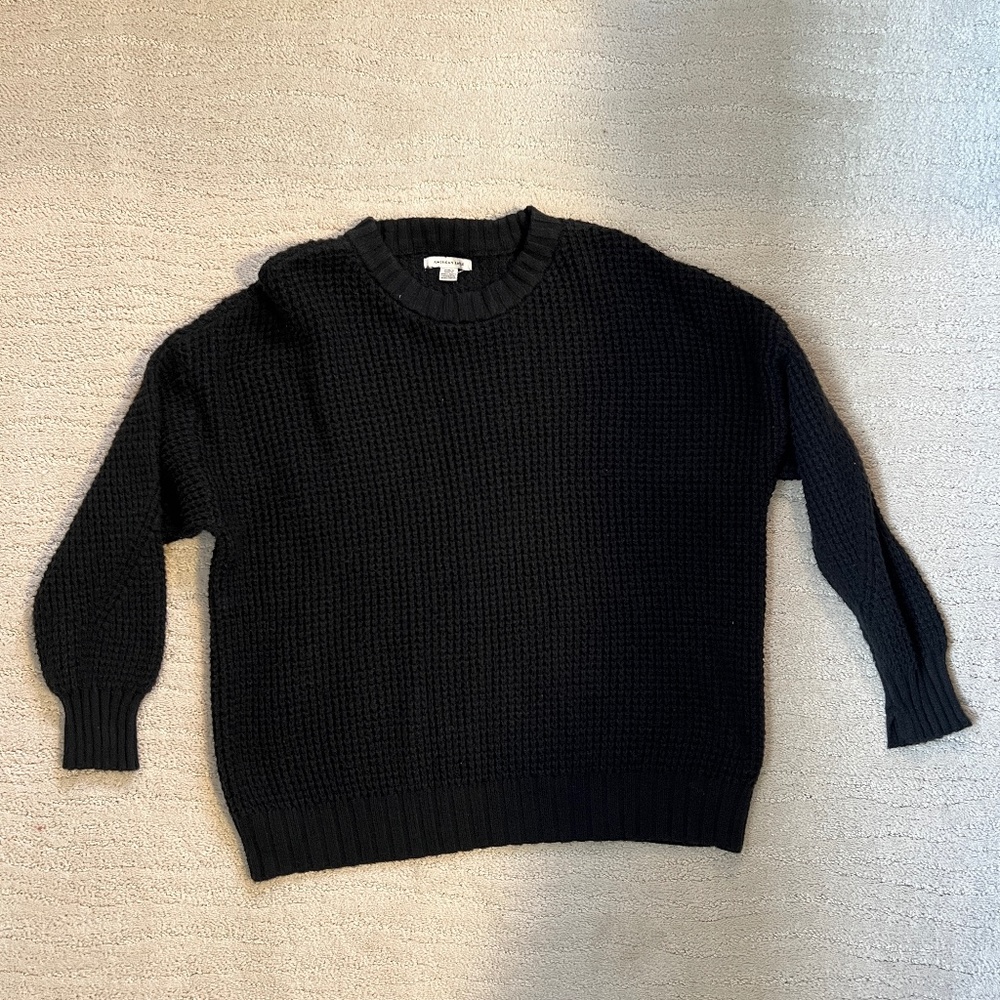 Black crochet type sweater